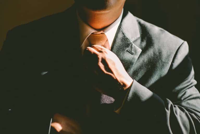 Man with coat and tie