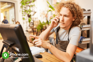 Florist using a mobile phone.