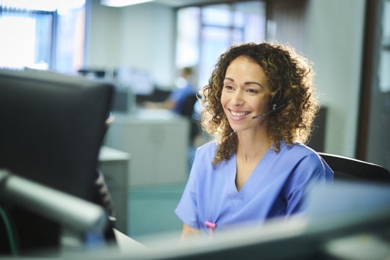 Healthcare worker on the phone.