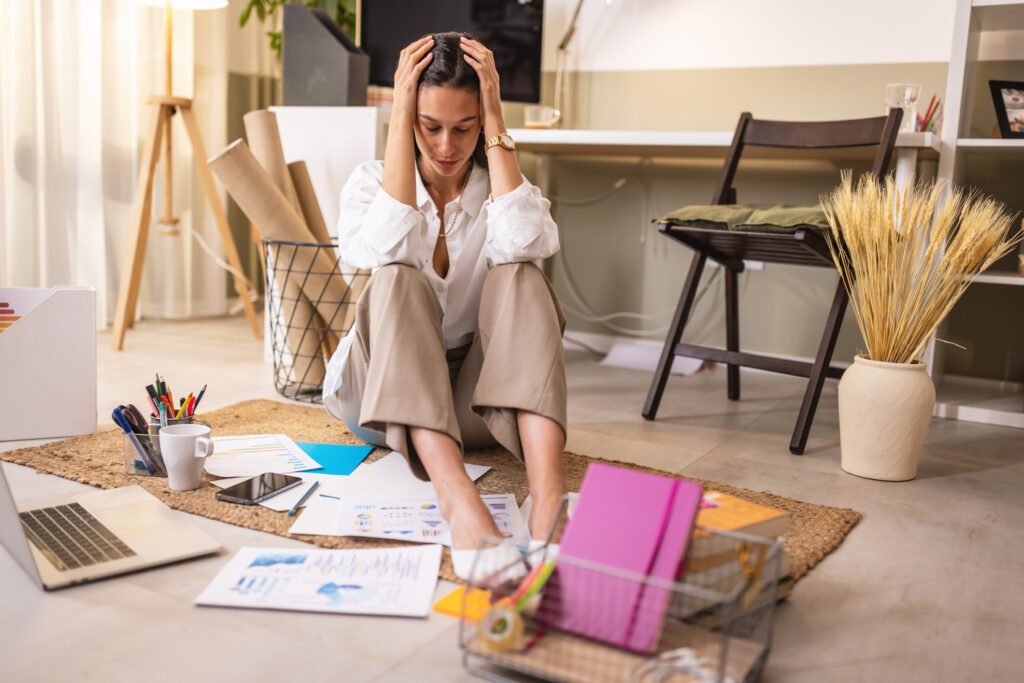 Young business woman fearful of starting small business