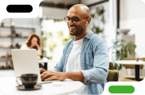 Man making a phone call on his computer.