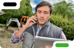 Landscaper speaking on a mobile phone.