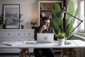 Remote worker reading a text message.